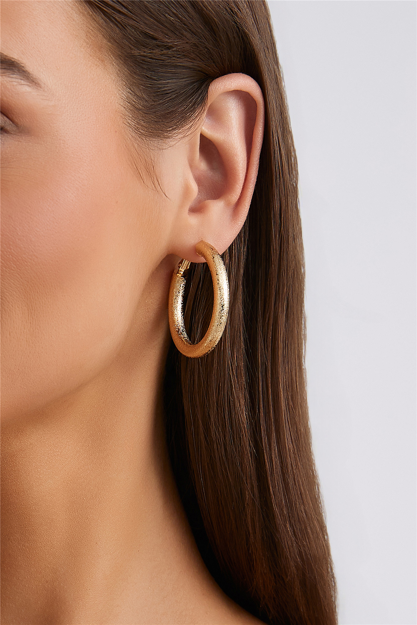 Dazzle From Far Earrings Gold